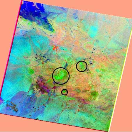 Search for hydrothermally modified rocks to identify porphyry copper deposits