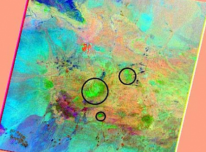 Search for hydrothermally modified rocks to identify porphyry copper deposits